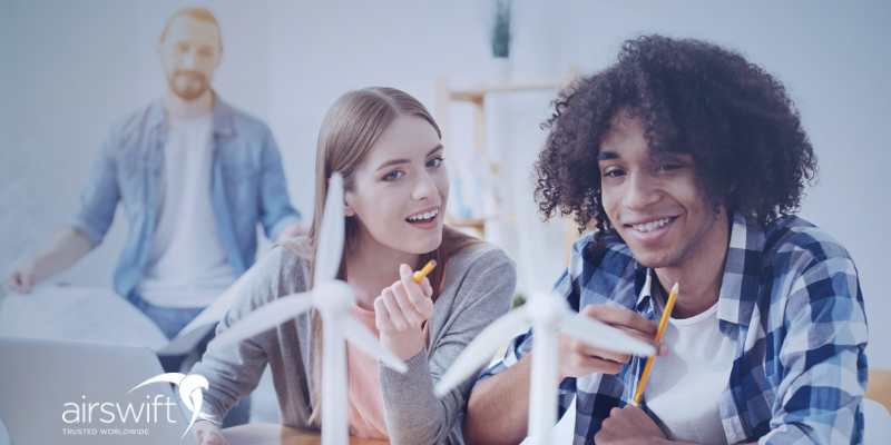 Diverse Gen Z team working together on a renewable energy project