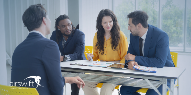 Diverse panel interview session, fostering inclusion in tech recruitment.